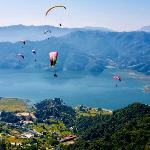 Paragliders over Phewa Lake, Pokhara, Nepal