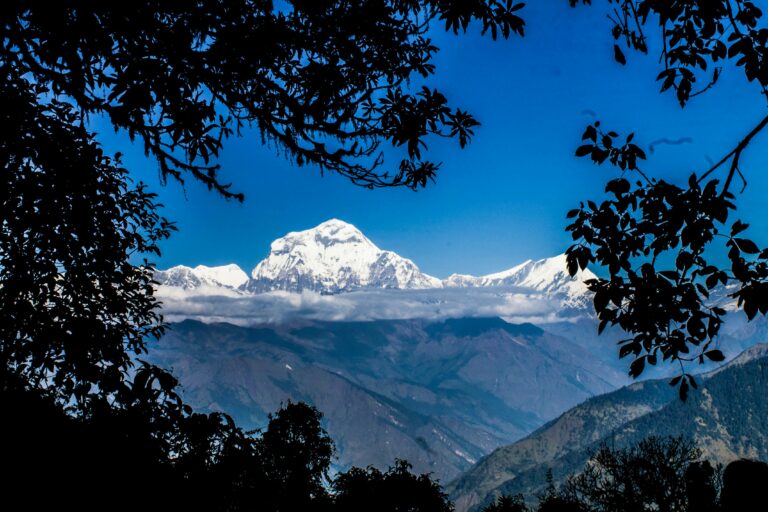 Cloud breaking over the Annapurna range seen from the Poon Hill trail, Nepal