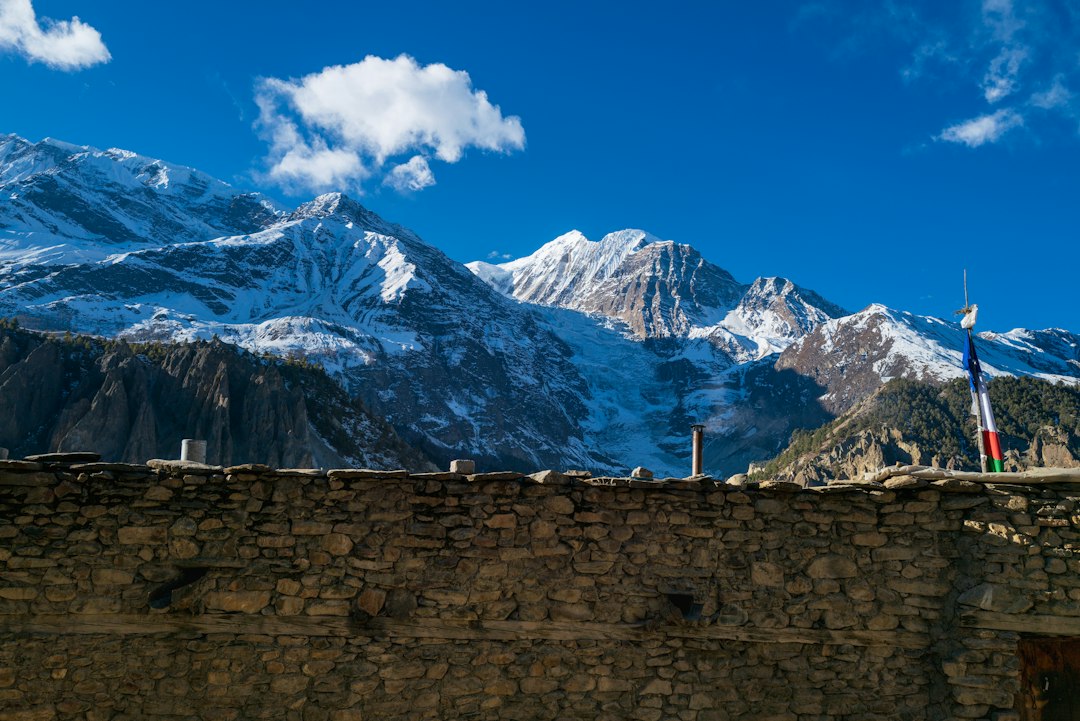 Snow-capped Himalayan peaks above a mountain pass